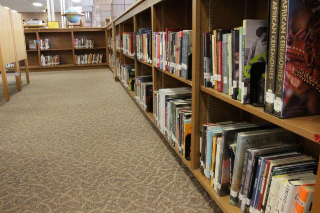 Books on shelves in the library