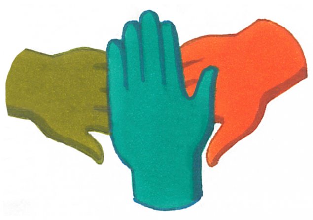 Multicolored hands on top of each other