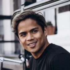 Smiling Filipino man with short hair