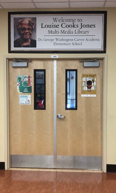 Carver Library Entrance With Dedication Banner for Ms. Cooks Jones