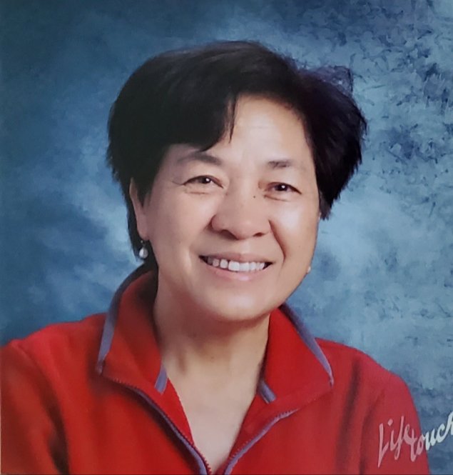 Smiling Asian woman with short hair