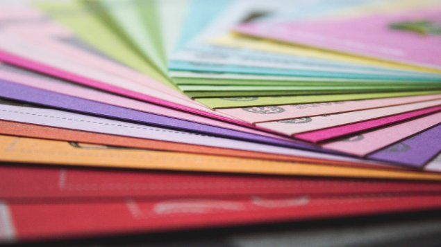 A stack of colorful folders. 