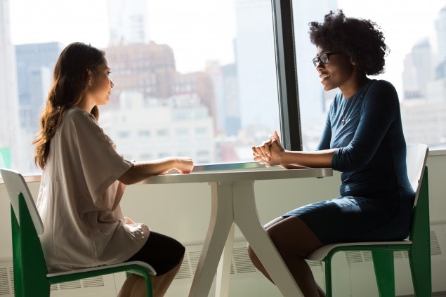 Two women are talking to each other during a job interview. 